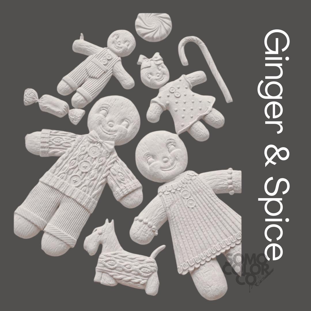 White gingerbread men and dog cookie cutters on a gray background with 'Ginger & Spice' text.